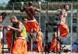 Inmates exercise at the California Institution for Men state prison in Chino